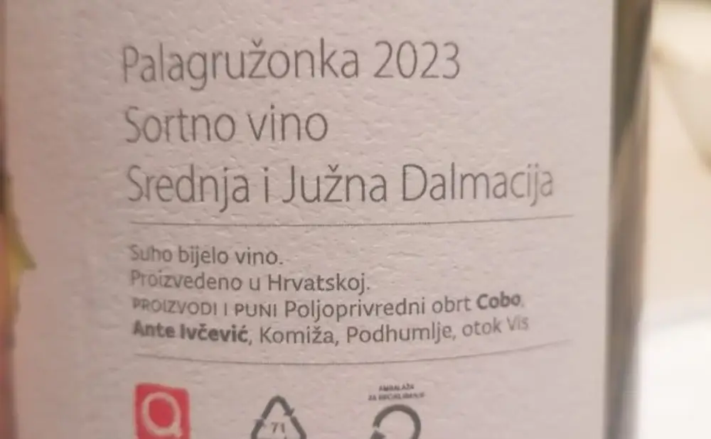 A glass of Palagružanka paired with seafood at the Vis Story of Wine tavern on Vis.